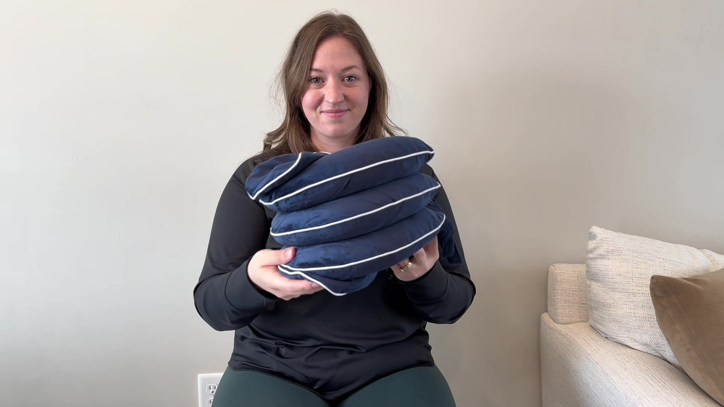 Happy customer holding CerviRelief neck traction device